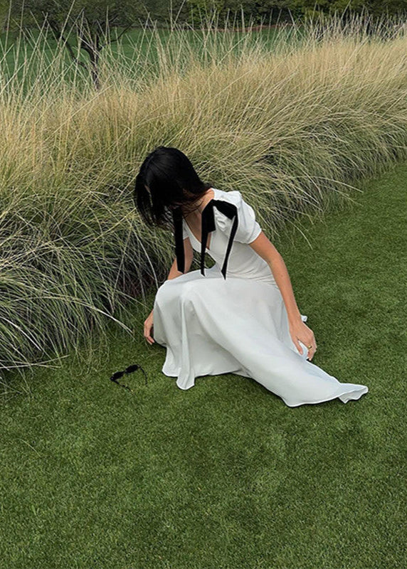 Garden Muse - Vestido maxi de satén con mangas abullonadas y lazos de terciopelo