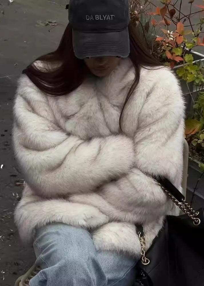 Giacca con colletto in pelliccia sintetica di peluche