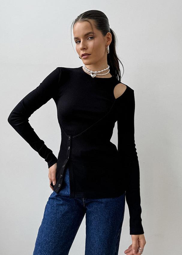 Haut en tricot noir à découpe asymétrique