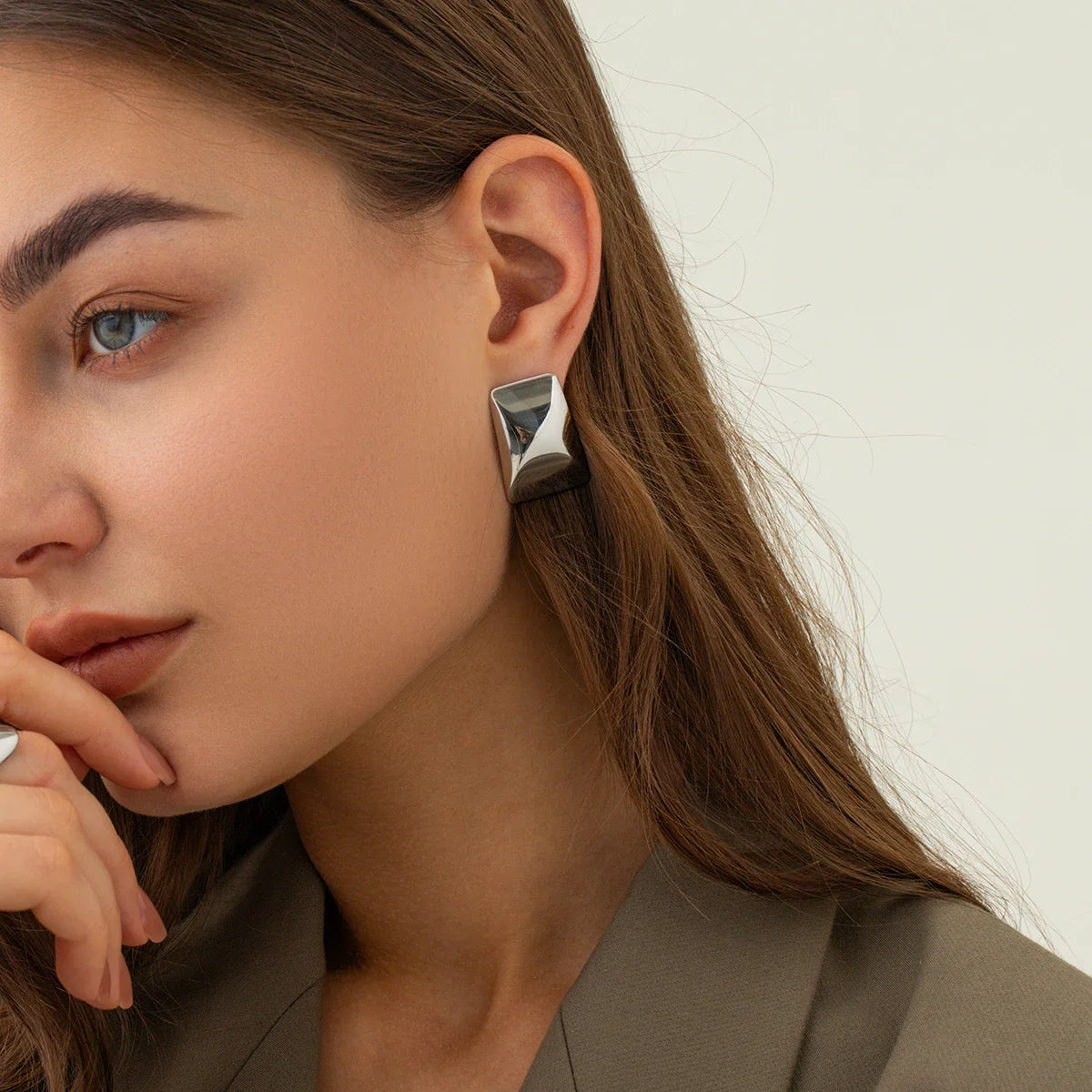Boucle d'oreilles Sculptées en Or - Vague Audacieuse