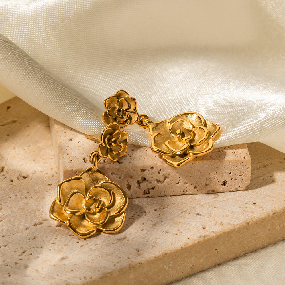 Fleur Gouden Dangle Oorbellen