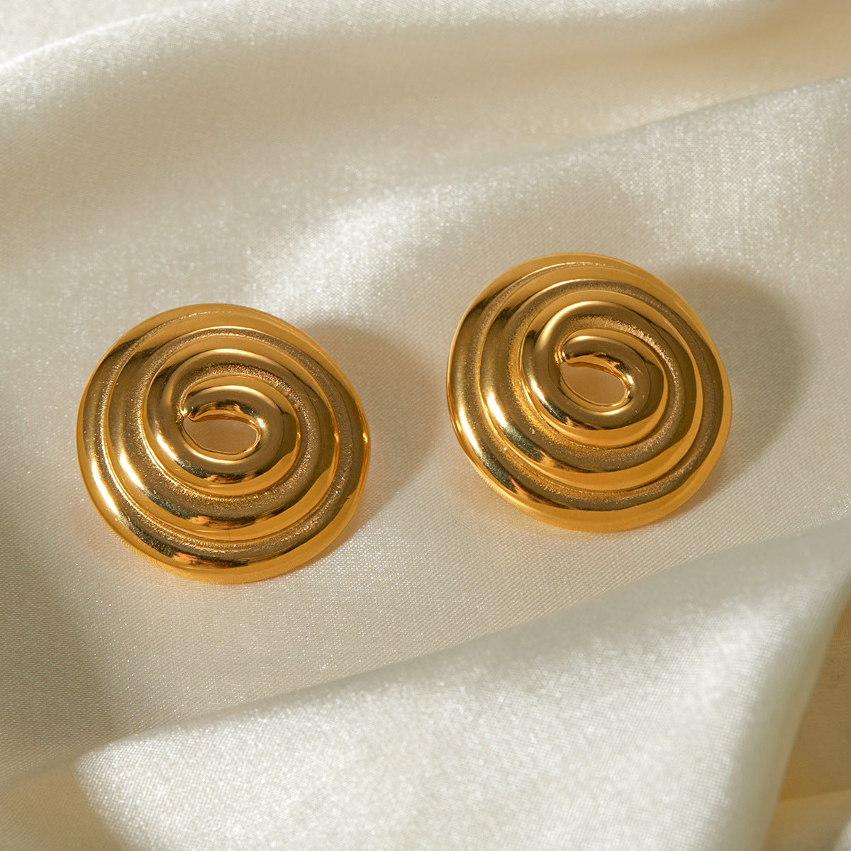 Luxe Spiraal - Gouden Ronde Oorbellen
