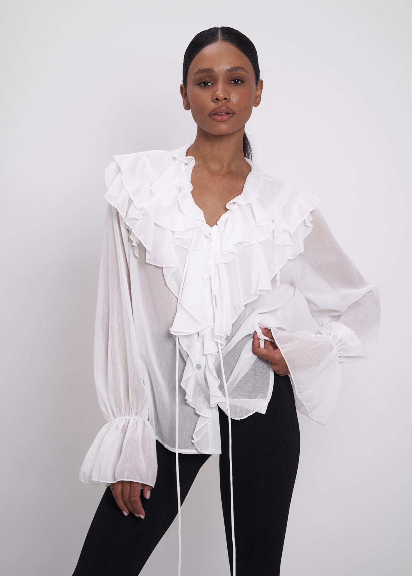 Blusa de gasa transparente con volantes