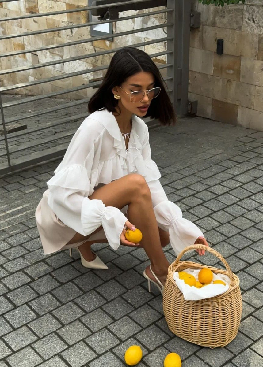 Isara - Blusa de gasa con volantes y escote con cordones