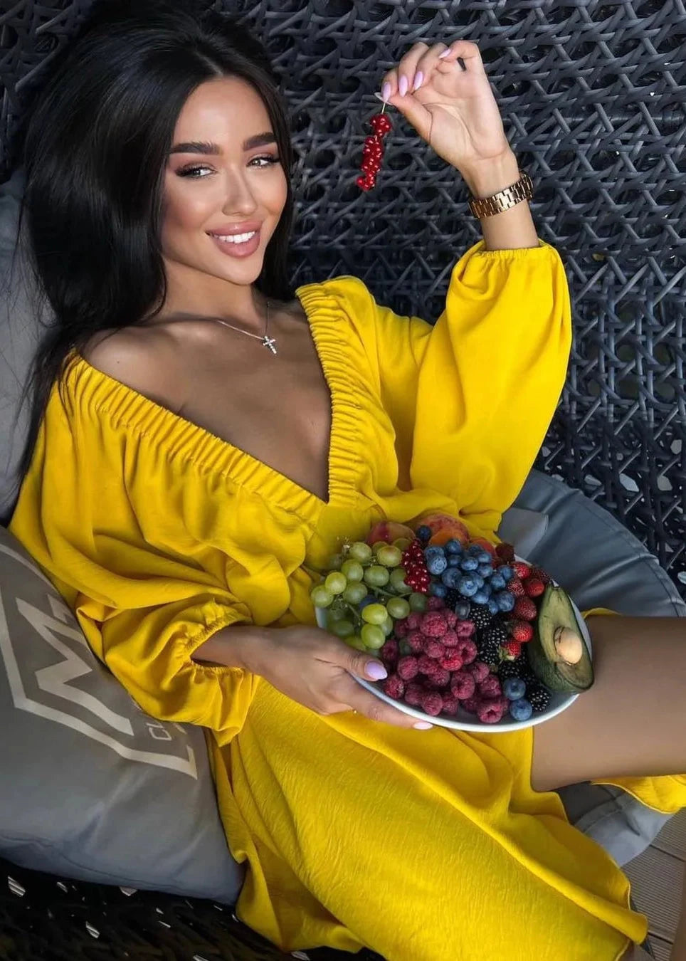 Robe élégante à manches lanternes et décolleté en V