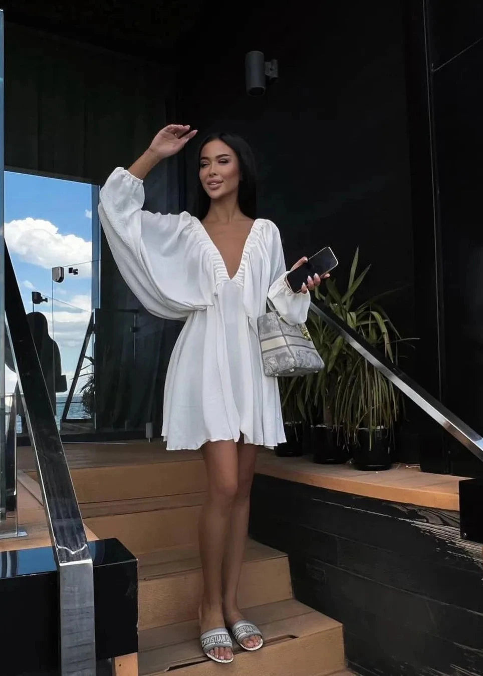 Robe élégante à manches lanternes et décolleté en V