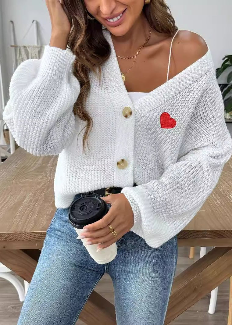 Cardigan boutonné en tricot avec broderie en forme de cœur