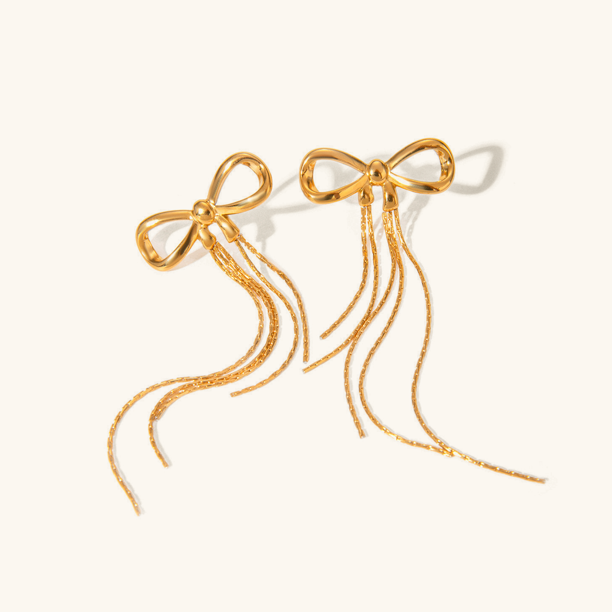 Graceful Gold Bow Drop Earrings