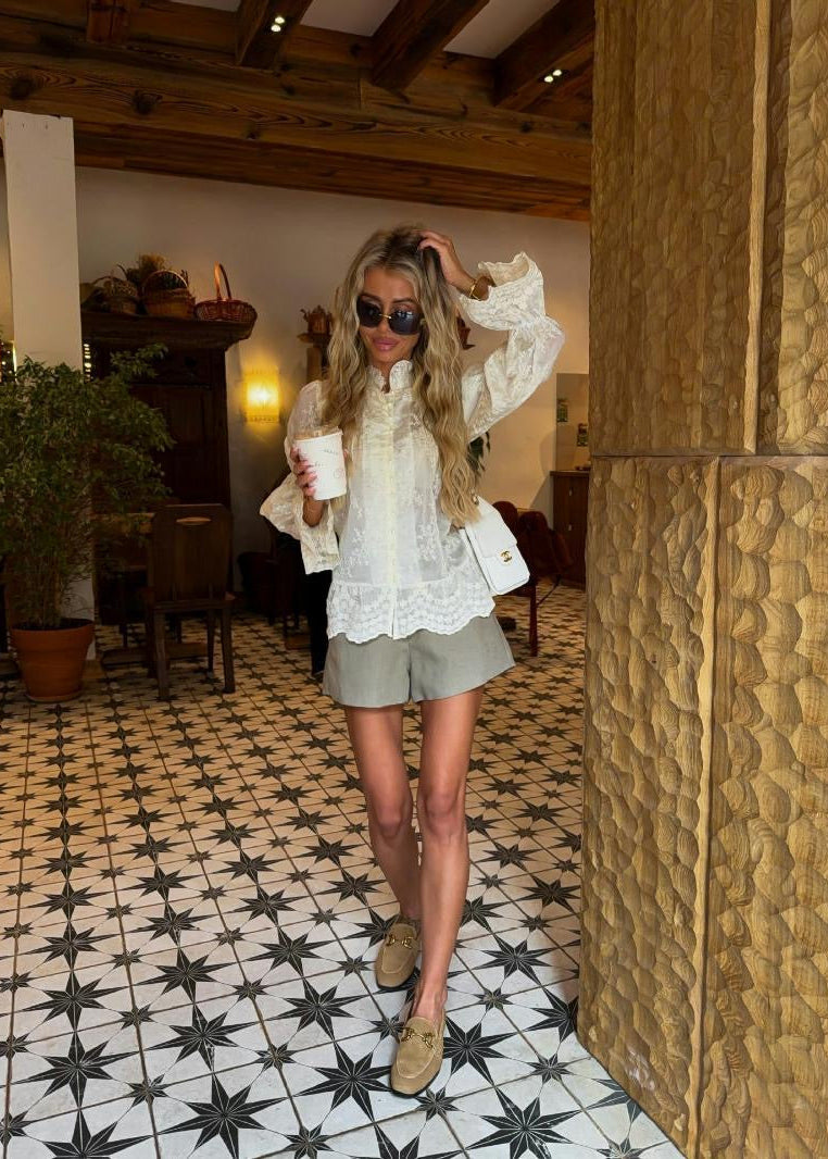 Ivory Embroidered Blouse with Pearl-Look Buttons and Flared Cuffs
