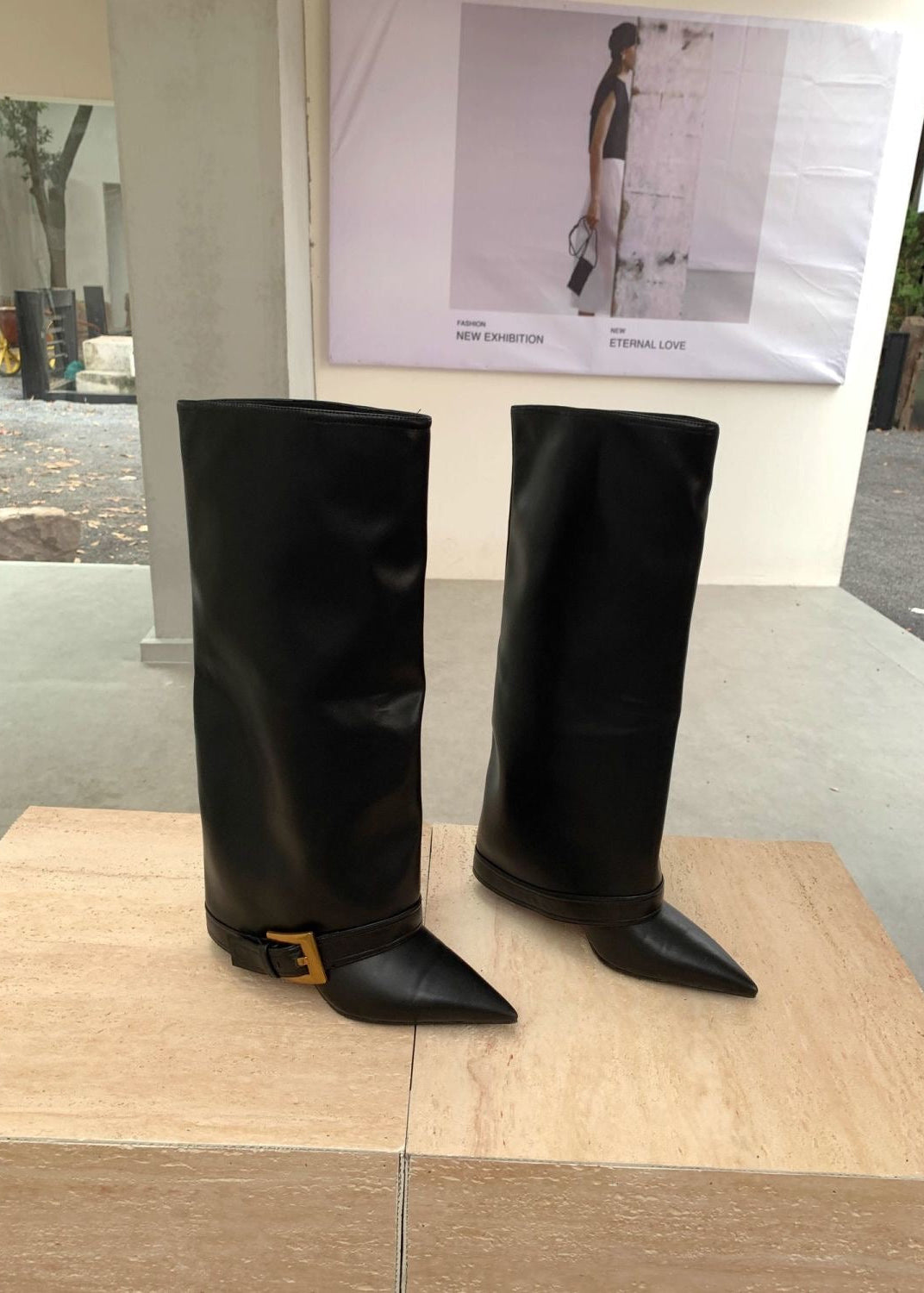 Black Pointed-Toe Knee-High Boots with Buckle Strap