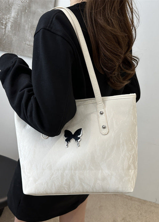 Butterfly Crest PU Shoulder Tote – Cream Textured Bag with Long Handles