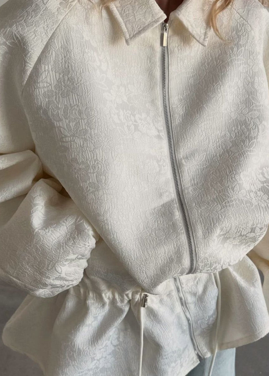 Ivory Jacquard Peplum Drawstring Jacket