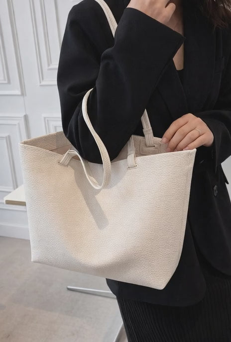 Bolso de mano de cuero suave